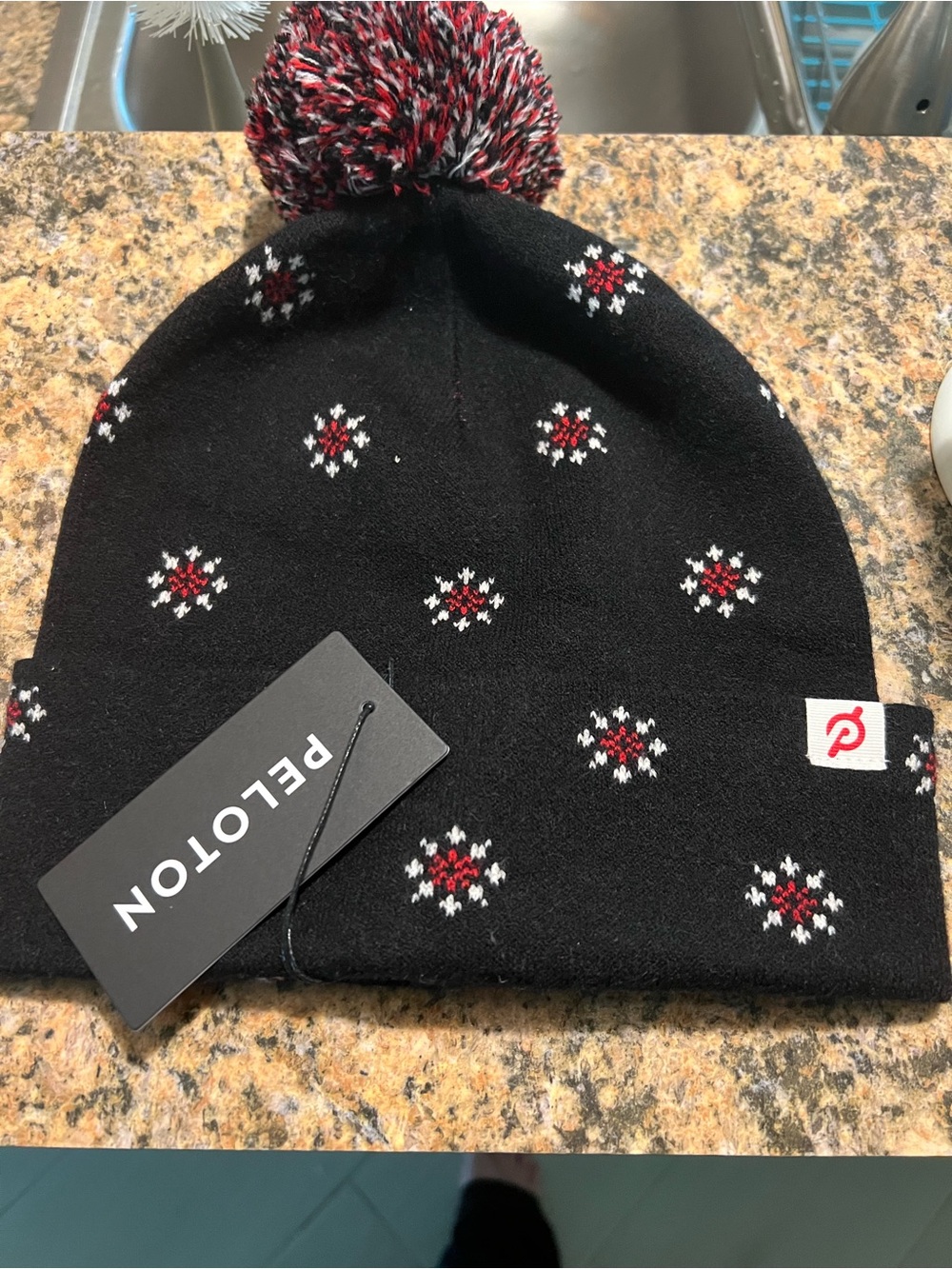 Peloton Black Knit Pom Beanie with Red and White Accents
